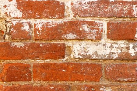 Brick wall made of old red brick.の写真素材
