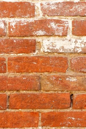 Texture of a brick wall made of old red brick.の写真素材