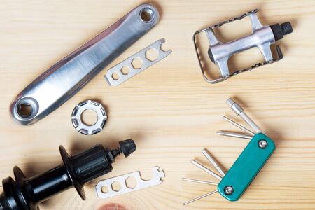Accessories for spare parts for mountain bikes. top view on a wooden background.の写真素材
