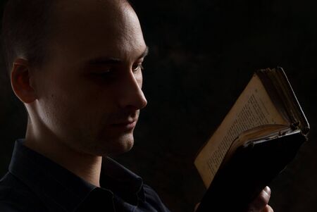 man in the dark -  A low-key portraitの写真素材