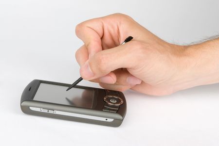 Mobile phone in man handの写真素材