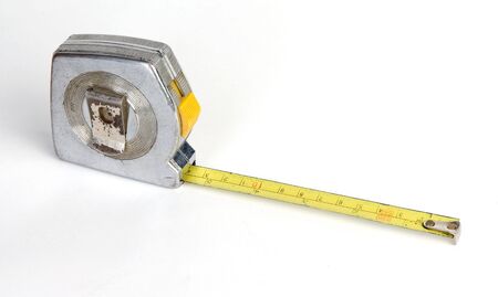 old measuring tool on a white backgroundの写真素材