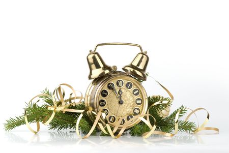 New Year concept. Alarm clock and conifer branchの写真素材