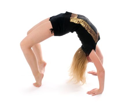 girl exercising on the floor isolated on the white backgroundの写真素材
