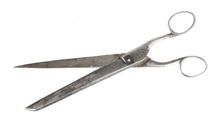 An old scissors isolated on a white background.の写真素材