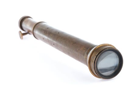 An antique spyglass isolated on a white backgroundの写真素材