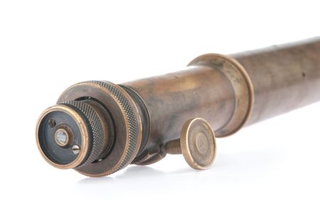 An antique spyglass isolated on a white backgroundの写真素材