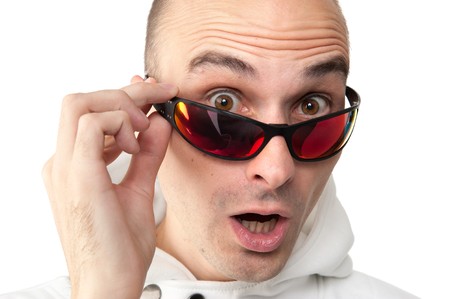 closeup portrait of a surprised young man