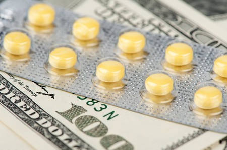 pills and US dollars closeupの写真素材