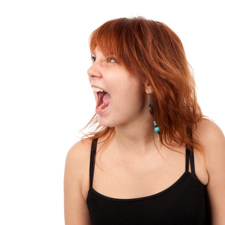 Screaming redhead womanの写真素材