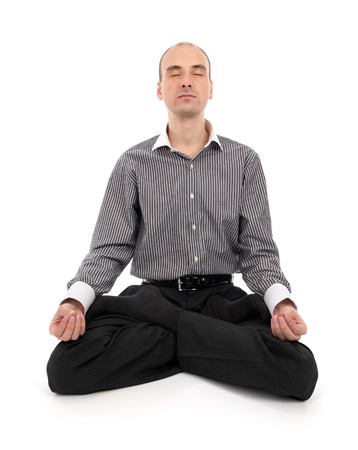 businessman meditating in yoga の写真素材