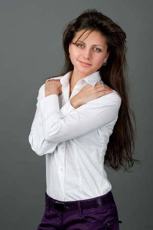 Portrait of pretty young smiling woman with long hairの写真素材