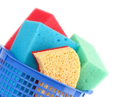 Brightly colored sponges on white backgroundの写真素材