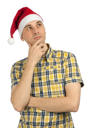 Young man in Christmas hat. Isolated over white backgroundの写真素材