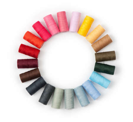 Pile of coloured threads isolated on white