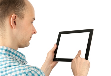 man using a tablet computer with white blank screen の写真素材