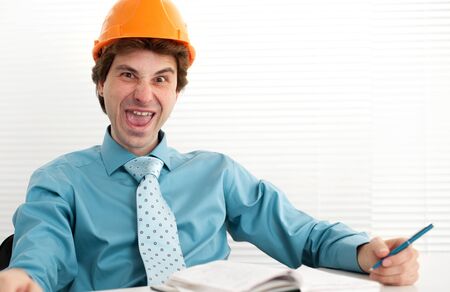 silly crazy man. Engineer in the office