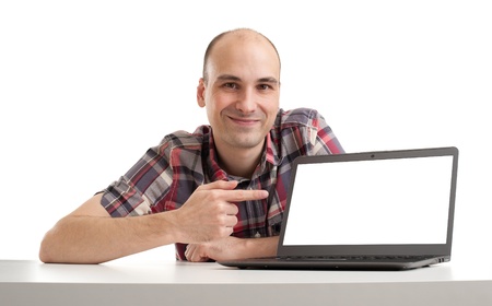 young man showing the laptop against white background