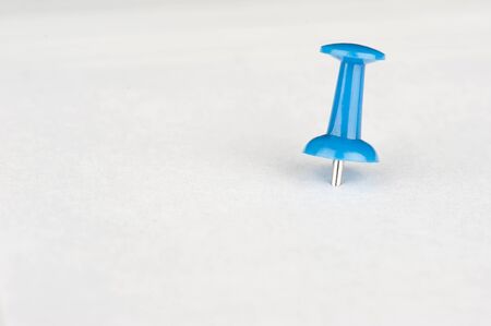 close up of a pushpin on white backgroundの写真素材