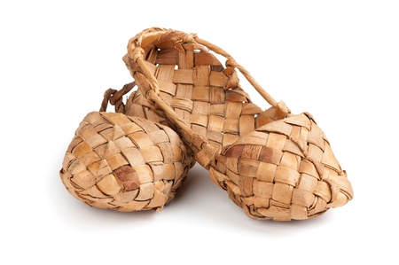 bast shoes. Old Russian sandals isolated over white