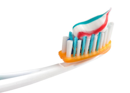 toothbrush with toothpaste isolated on whiteの写真素材