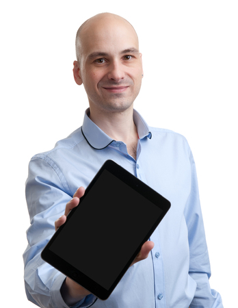 Happy man with tablet computer isolated over whiteの写真素材