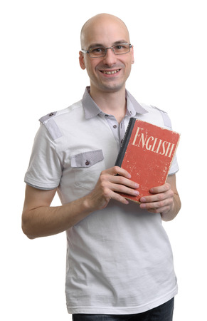 English education. Happy casual man with book. Isolated on white の写真素材