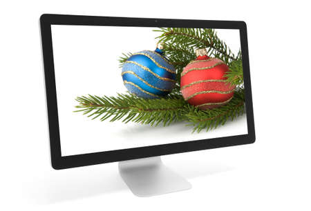 christmas decoration on screen of computer monitorの写真素材