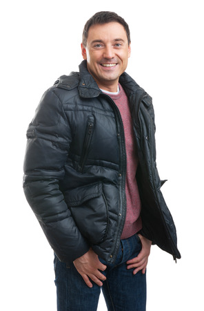 handsome man wearing a winter coat isolated over whiteの写真素材