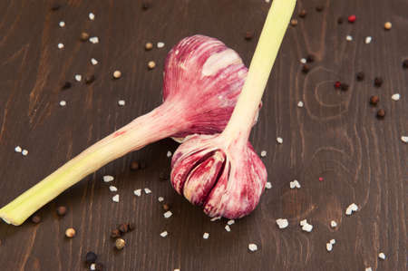 Organic garlic on wooden backgroundの写真素材
