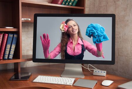 cleaning service online concept. Housewife in computer monitor