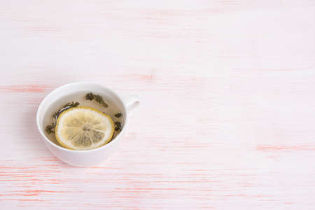 close up of cup of tea with lemonの写真素材