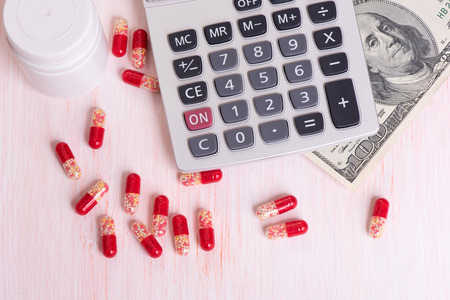Money, pills and calculator. The Cost of Addiction.の写真素材