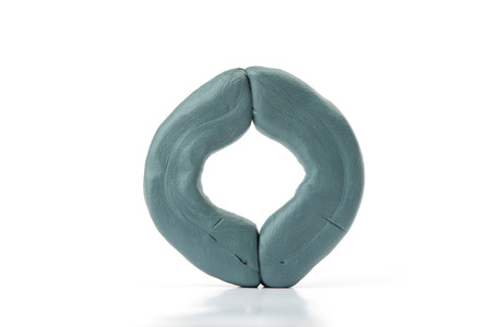 Colour plasticine letter isolated on a white backgroundの写真素材