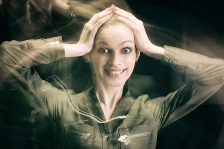 portrait of surprised happy woman concept. Dark background