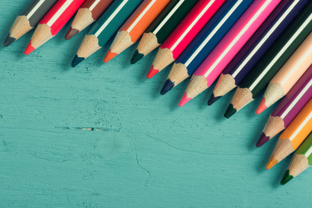 close up of Colour pencils on blue wood backgroundの写真素材
