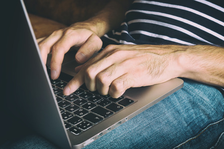 man using laptop at his house. People lifestyleの写真素材