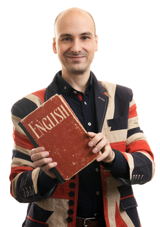 man holding an English book isolated on white backgroundの写真素材