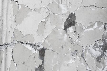 cracked plaster texture. Vintage cracked concrete wall background