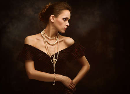beauty woman fashion portrait over dark background
