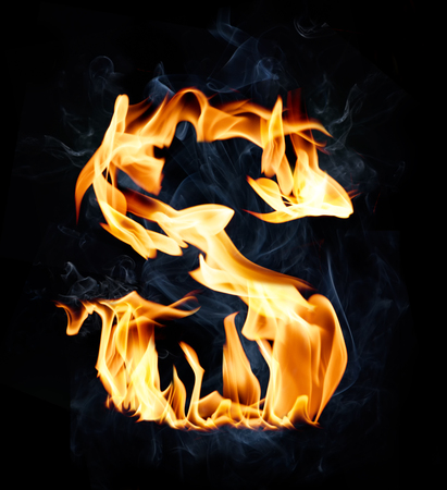 Letter S. Fire and smoke alphabet over black backgroundの写真素材