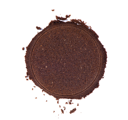 Coffee tempering. Used coffee from coffee machine isolated on whiteの写真素材