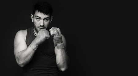 black and white portrait of a boxer with copy space