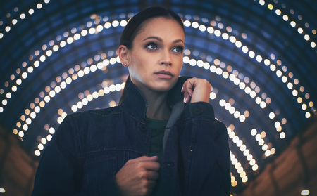 beautiful fashionable woman wearing casual clothes. Outdoors portrait of a pretty girl in trendy denim jacket.の写真素材