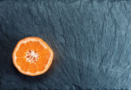 cross section of a tangerine fruit. Top viewの写真素材