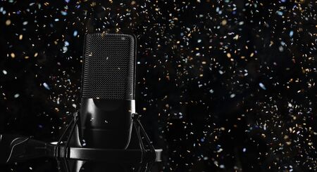 Microphone over black background close upの写真素材
