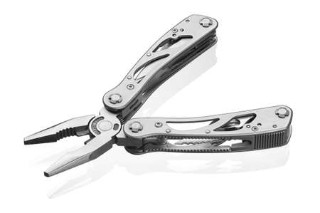 Multi tool with expanded tools and pliers isolated on a white background. Clipping path included