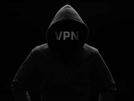 dark mysterious man in a hoodie is hiding his face. Vpn conceptの写真素材