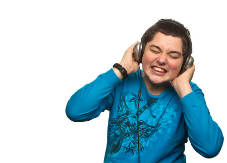 Boy with headphones isolated on white の写真素材
