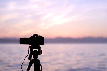 The black camera on a support against a declineの写真素材